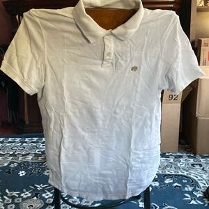 Banana Republic men’s polo size M. Approx 27 inches long. Nice condition. Z24
